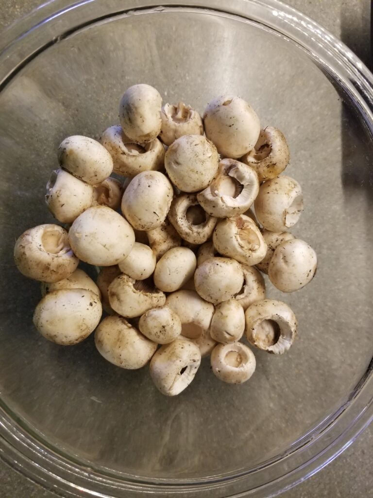 cleaned mushroom caps, ready for marinating