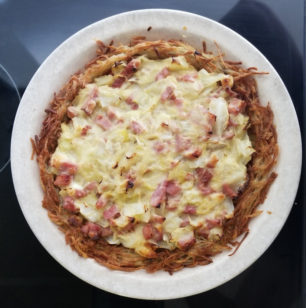 Cabbage, Ham, and Jarlsberg Pie with Hash Brown Potato Crust