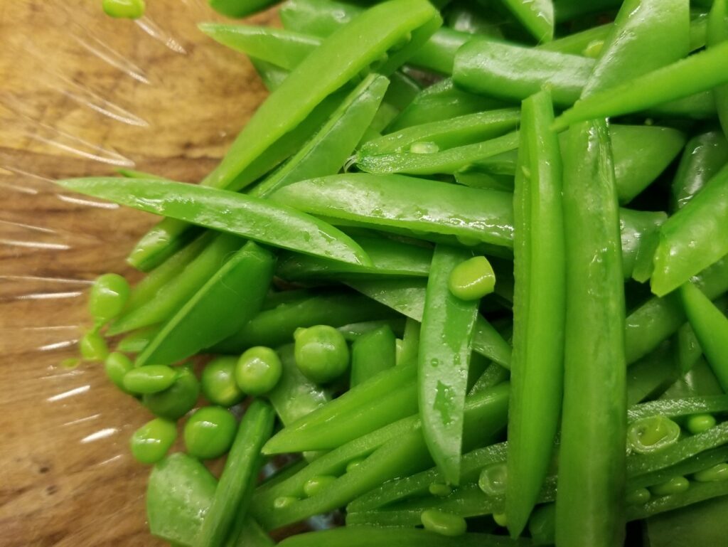 sliced peas for the salad