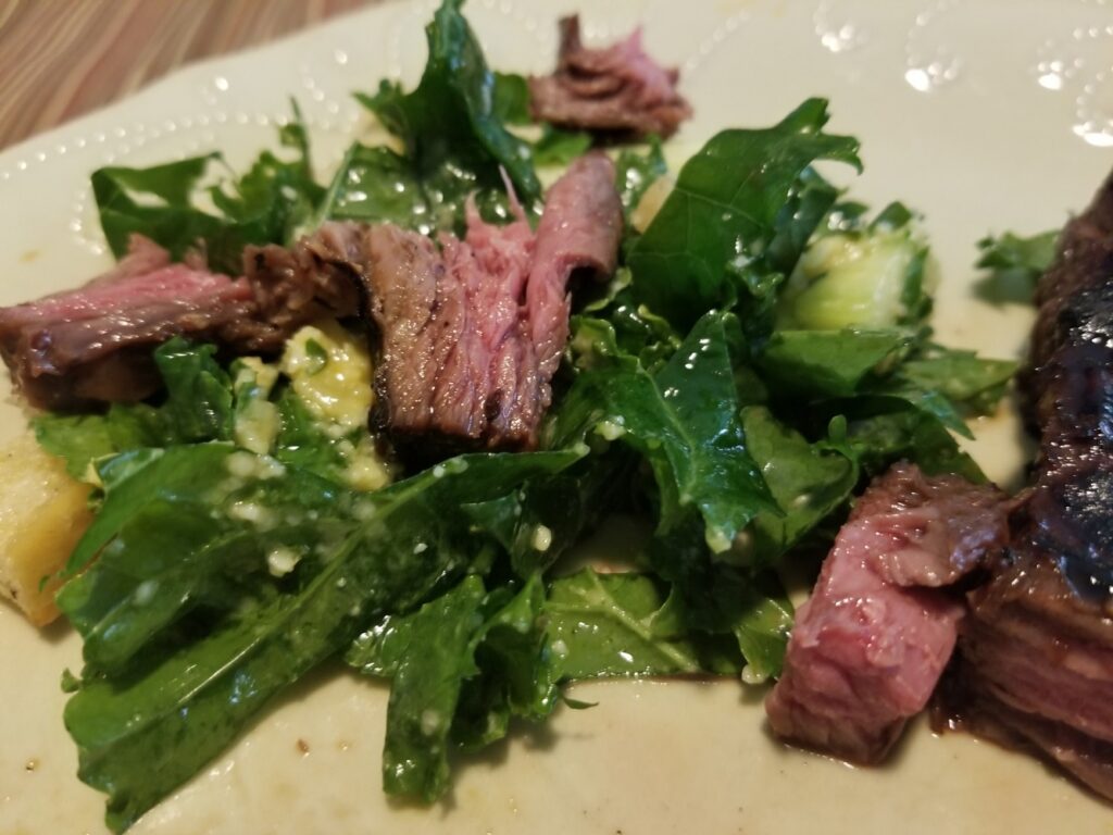 Garden kale Caesar salad and marinated, grilled skirt steak