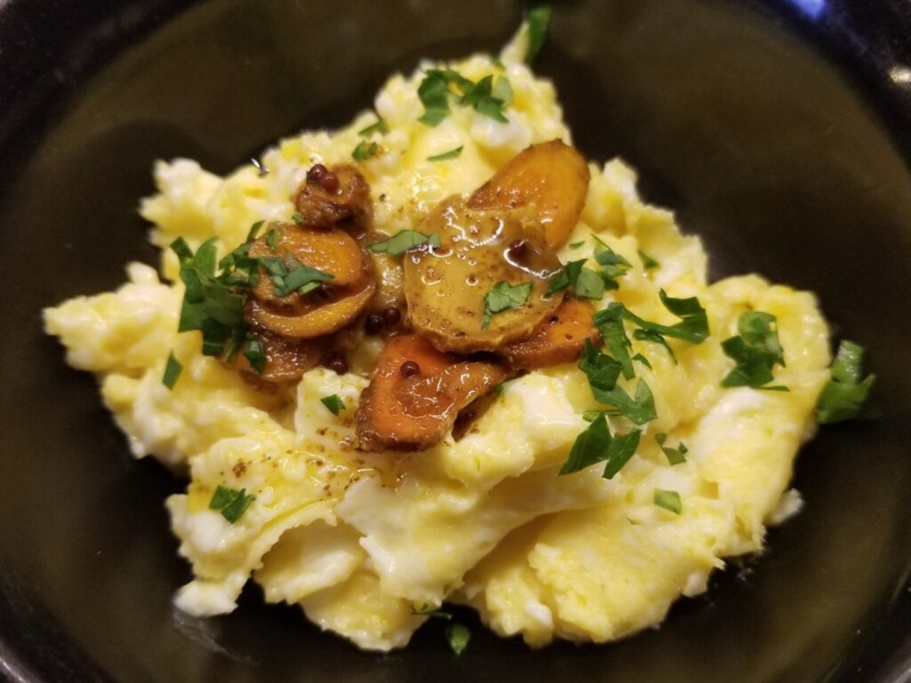 Ginger Turmeric Condiment on scrambled eggs