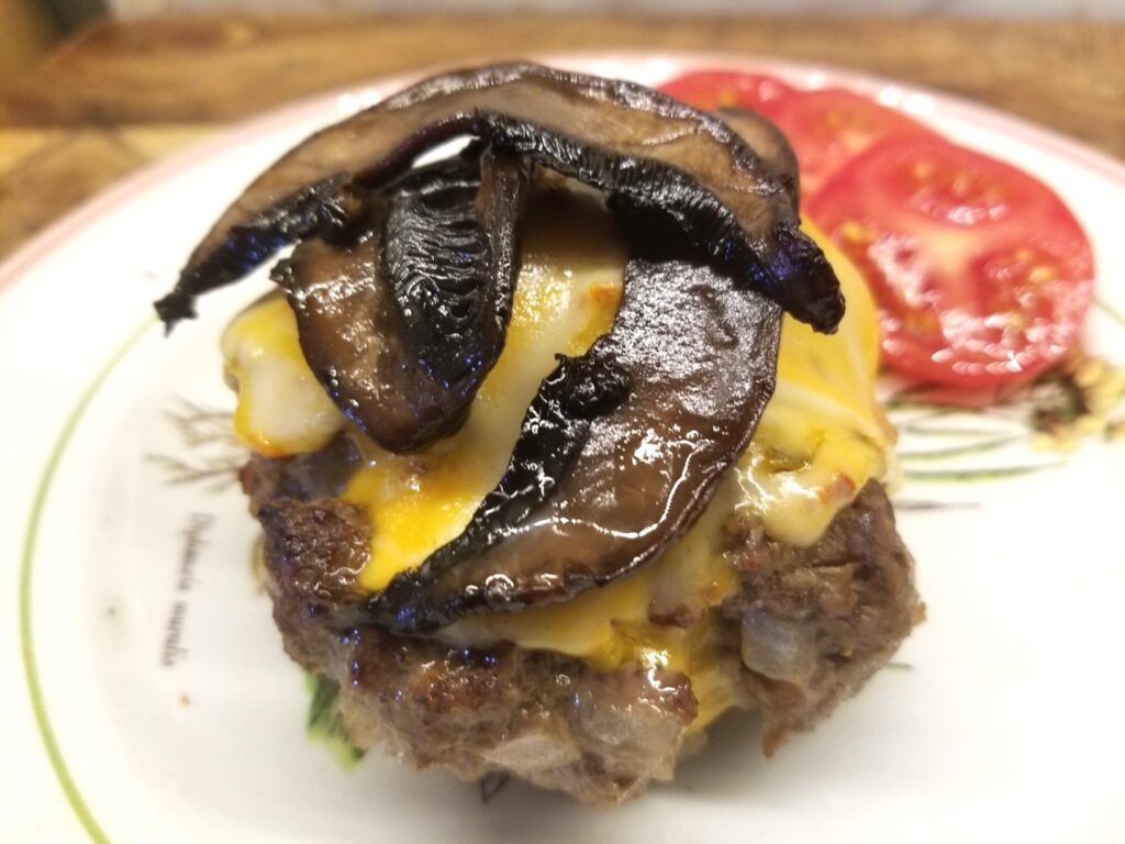 Portobello Mushroom Bacon on a bun-less cheeseburger