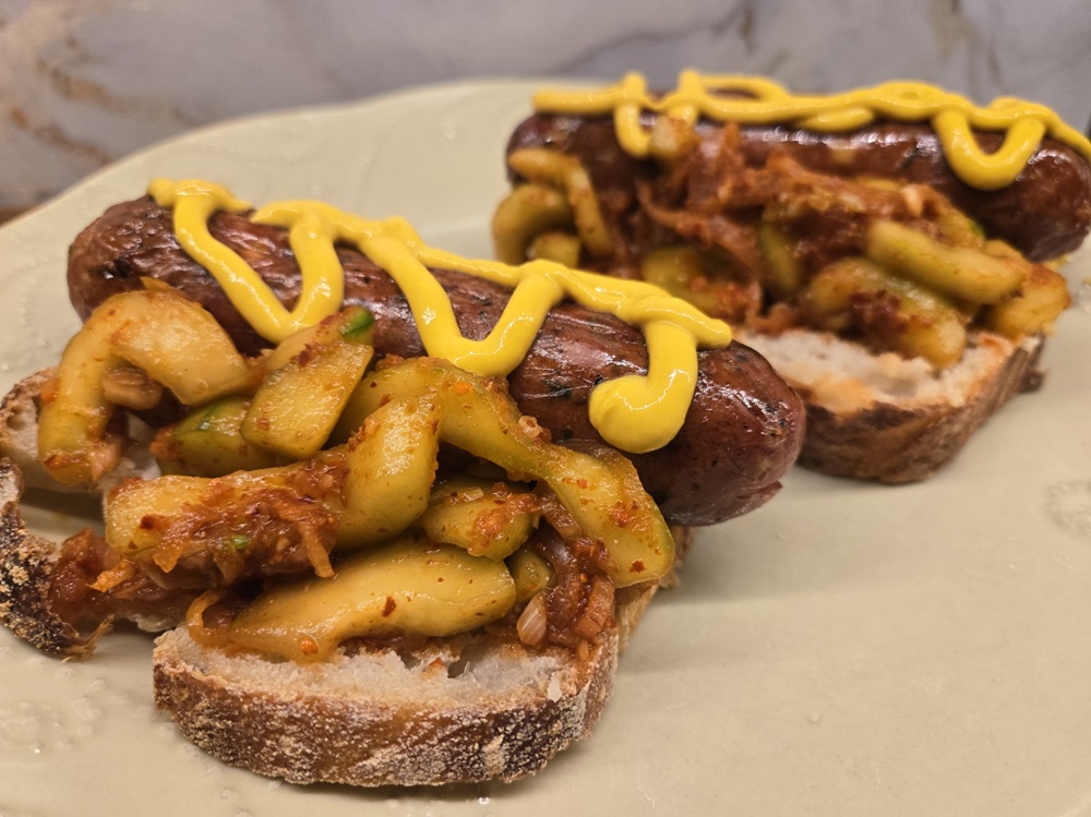 Cucumber Kimchi and mustard with chicken sausage on sourdough bread